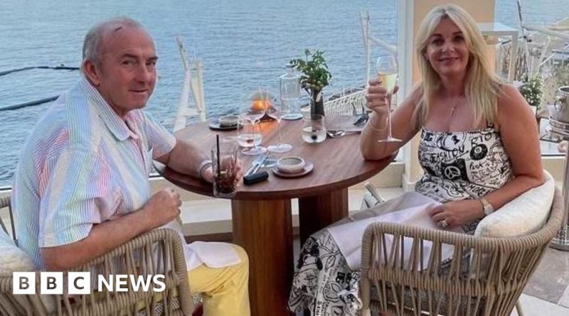 A group in professional attire discussing asbestos-related cancer case.