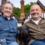 Gone Fishing dog Ted alongside hosts enjoying nature and fishing.