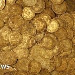 A father safeguarding a medieval coin hoard in a home setting.