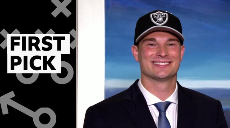 Excitement at the NFL Draft with fans watching the first pick.