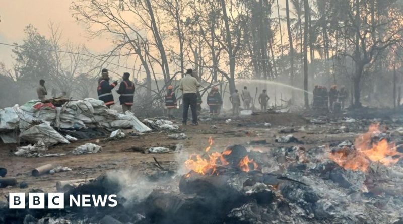 Emergency responders at a fireworks explosion scene in India.