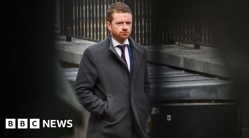 A professional office meeting scene with Morgan McSweeney allegations discussed.