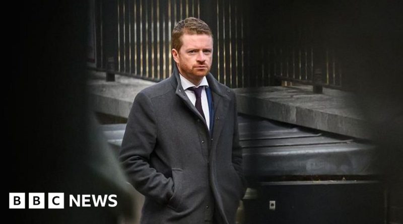 A serious meeting regarding the Mandelson appointment testimony in a professional setting.