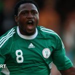 Players showing concern for Michael Eneramo during a match.