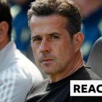 Fulham Aston Villa match players celebrating their victory on the field.