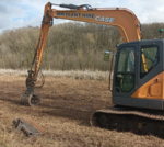 Professionals engaging in wetland conservation funding efforts for biodiversity.