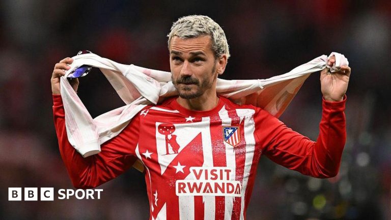 Professional football players celebrating a Champions League victory with Griezmann farewell.