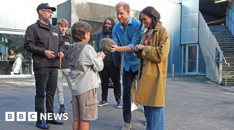 Diverse group on an Aboriginal culture tour in Melbourne, learning about Indigenous history.