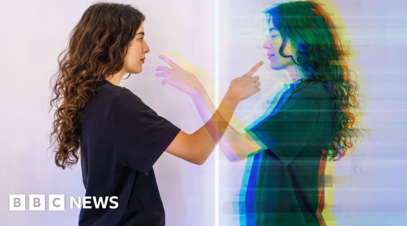 Professionals discussing productivity using digital twins in an office.