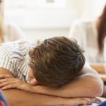 A classroom filled with tired children, showing the impact of kids sleep patterns.