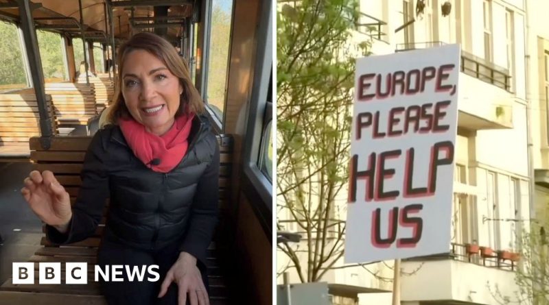 Group of professionals discussing Hungary election impact on US-Russia relations.