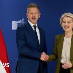 Hungary EU funds discussion among leaders in formal meeting attire.