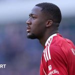 Ibrahima Konate discussing his Liverpool contract in a professional setting.