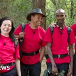 A scene from I'm A Celebrity with contestants celebrating their journey.