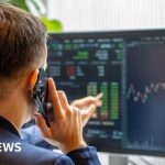 Professionals discussing the impact of falling share prices on finances.