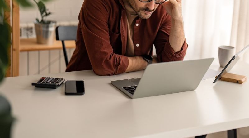 Professionals focused on tax filing in a modern office setting.