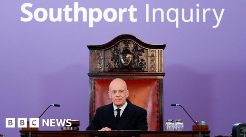 A serious professional meeting discussing Southport attack prevention strategies.