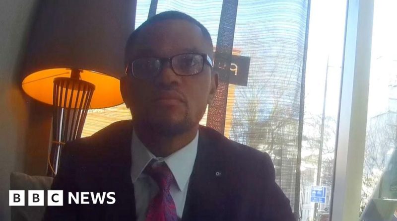 Professionals discussing domestic abuse claims and policies in an office setting.