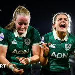 Ireland women's rugby team practicing strategies on the field.