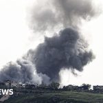 Diplomats discussing urgent peace talks regarding Israeli airstrikes in Lebanon.