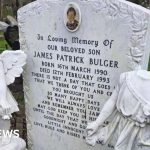Family members visiting the grave of James Bulger in a respectful manner.