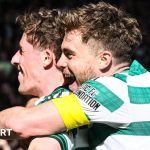 James Forrest demonstrating teamwork during Celtic football training session.