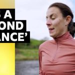 A diverse group of runners competing in the London Marathon 2026, showcasing determination and resilience.