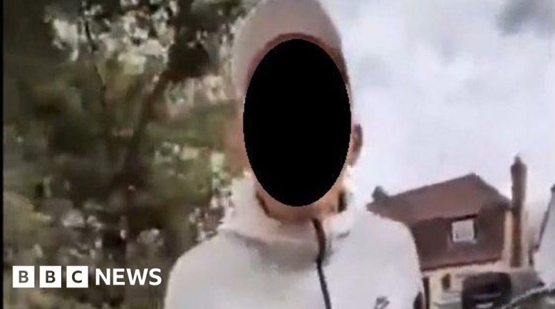 A diverse group of people in professional attire discussing antisemitic attack awareness.