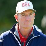 A team of golfers in professional attire discussing strategy for the Ryder Cup.