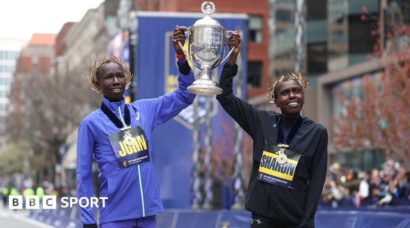 Runners participating in the Boston Marathon setting a new record.