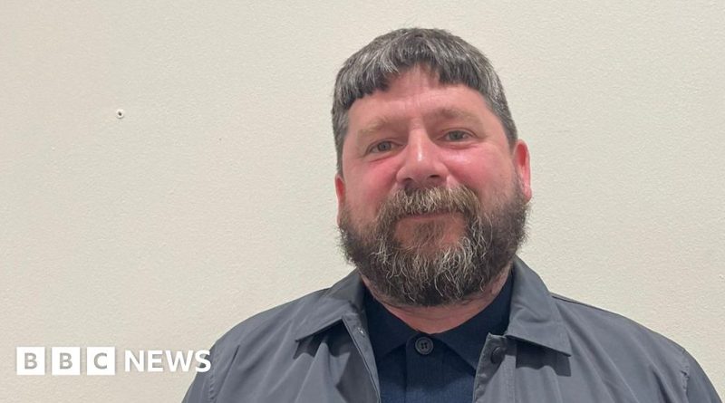 Kitchen staff managing food safety in a small burger kitchen.
