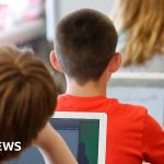 Students in a classroom engaging in activities without screens in LA school district.