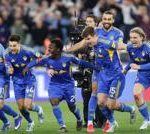 Diverse football fans cheering for Leeds in the FA Cup semi-final.