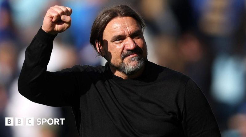 Group of football players celebrating a win, highlighting Leeds United safety.
