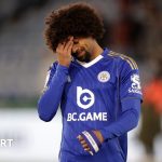 Fans at a football stadium showing mixed emotions during Leicester City decline.