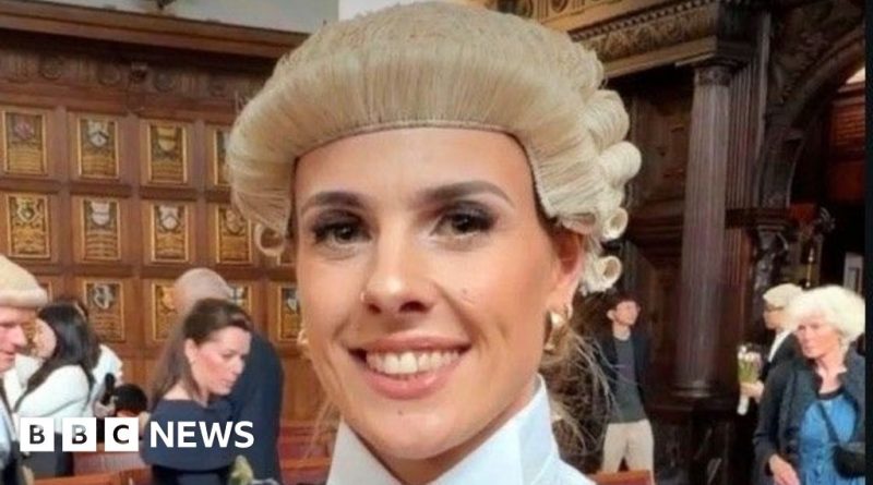 A professional barrister showing determination in her legal career journey.