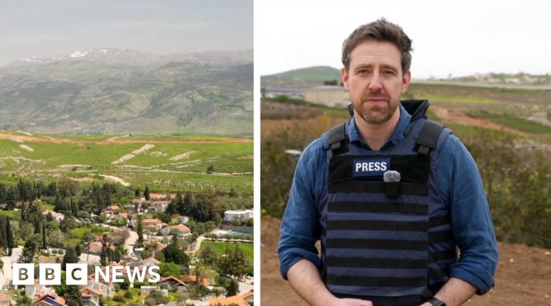 Metula, an Israeli town with families enjoying outdoor activities amidst mountains.