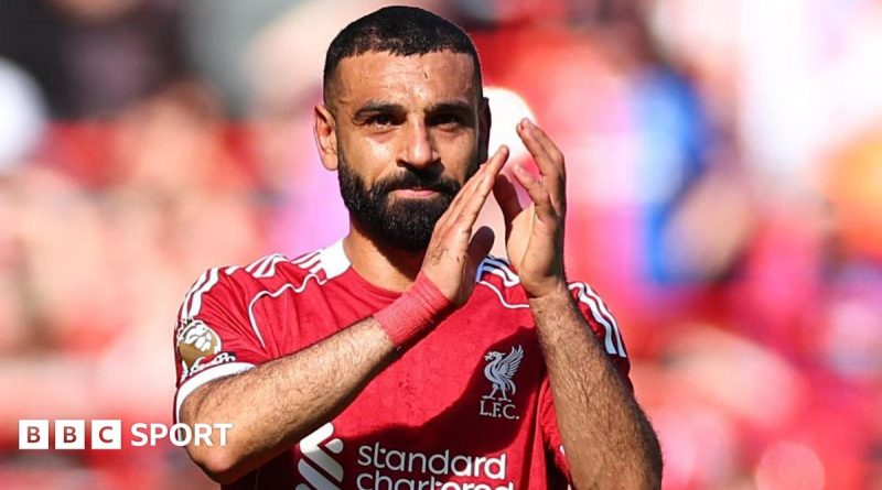 Liverpool medical team discusses Salah injury update in training room.