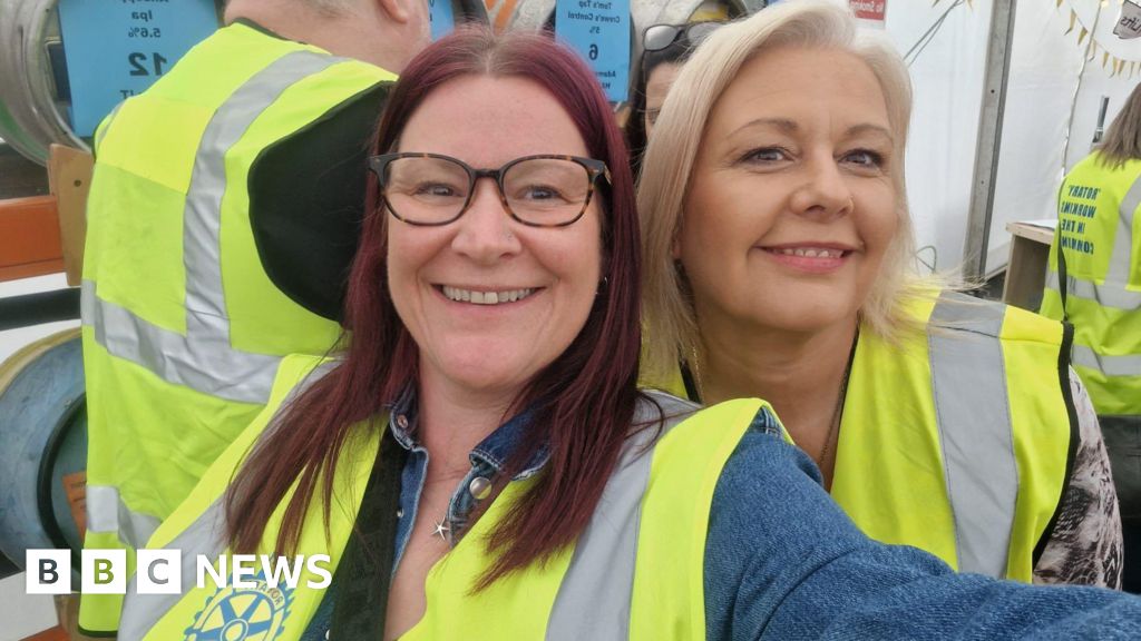 A diverse group of professionals discussing plans for communities to buy homes.