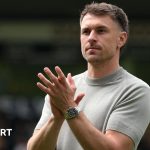 Aaron Ramsey runs the London Marathon in tribute to childhood cancer awareness.