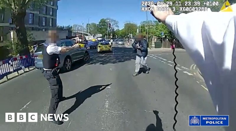 Police officers discussing an arrest related to the London police incident.