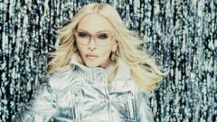 A group of musicians in a studio working on Madonna's new album.