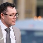 Courtroom scene depicting the manslaughter case acquittal with serious attendees.