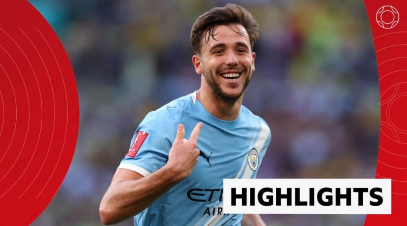 Manchester City players celebrating a goal during the FA Cup final match.