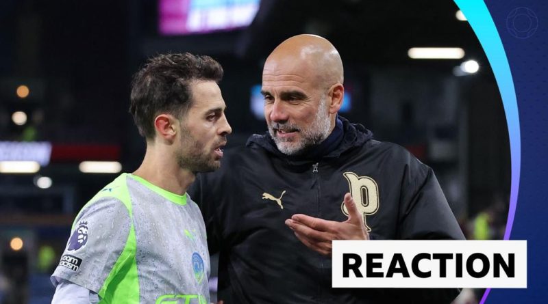 A focused Manchester City team discussing strategies during their title race.