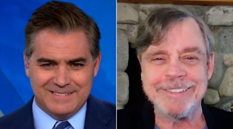 Professionals discussing the Mark Hamill Star Wars series in a modern office.