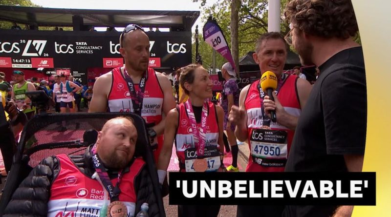 Matt Hampson and team celebrate finishing the London Marathon charity event.