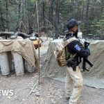 US agents discussing plans for a drug operation in a serious meeting.