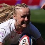 Millie David debut during a women's rugby match in a stadium.