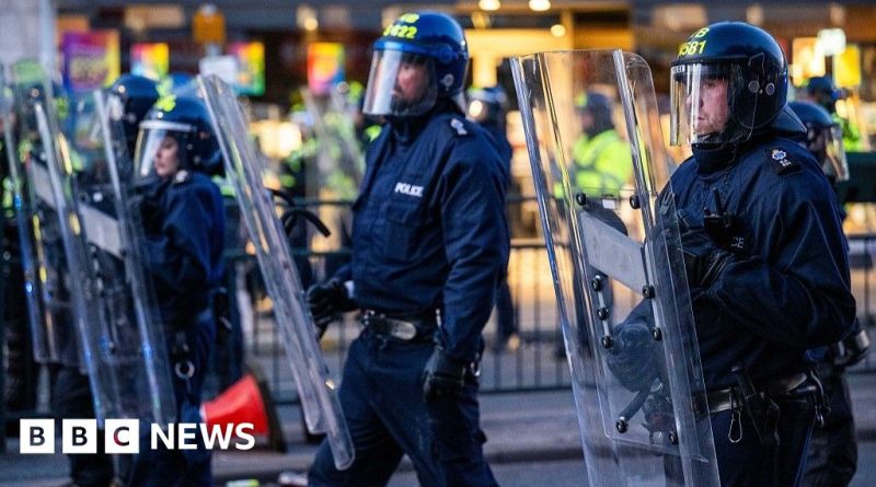 A meeting of professionals discussing misinformation and public outrage.